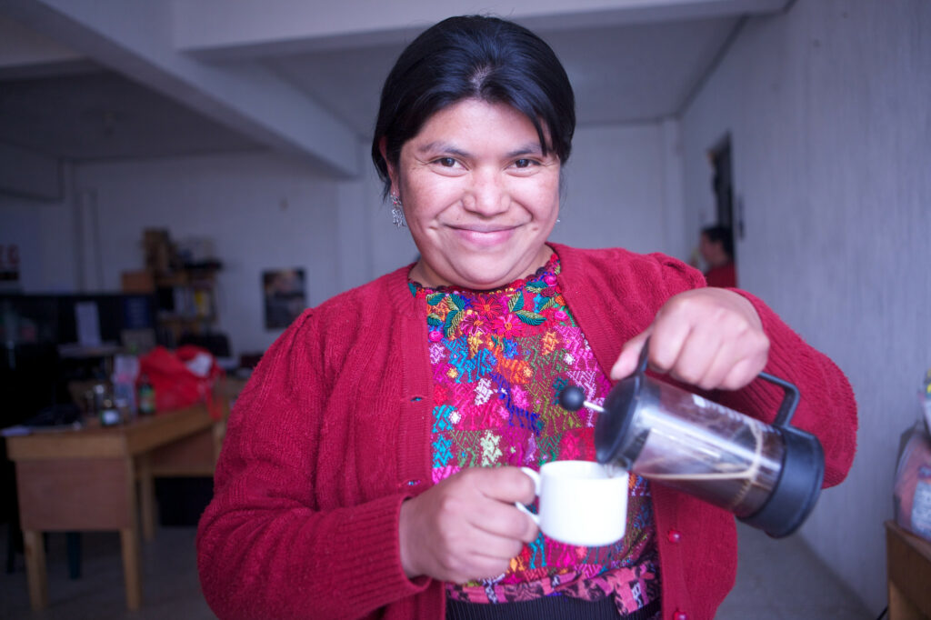 Guatemalan woman drinking coffee 